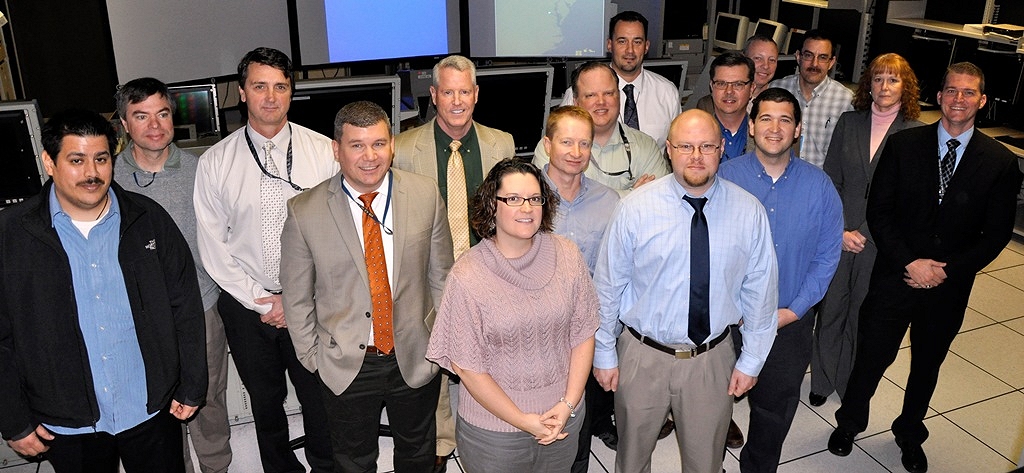 DAHLGREN, Va. - Navy and joint staff cybersecurity leaders are pictured during the USS Secure final planning conference held at Naval Surface Warfare Center Dahlgren Division (NSWCDD), Jan. 6-7. They were among 28 participants collaborating on a USS Secure test bed to enable the development, evaluation and testing of cybersecurity concepts and technologies to defend mission critical systems at sea and ashore. The cyber experts will examine USS Secure's ability to transition its cyberdefense technologies to the Fleet by replicating a naval combatant in a system of systems environment during a March 2016 test event. (U.S. Navy photo by John Joyce/Released)